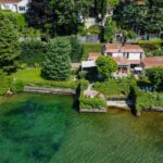 Lago di Como, Lierna FRONTE LAGO splendida VILLA mq.576 di moderno design con DARSENA COPERTA e 2.250mq di GIARDINO pianeggiante molto riservato affacciato sulle acque del lago per circa 78mt lineari!!